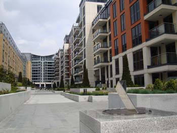 The sundial marks the transition between the concourse of the housing development and the park which is an integral part of the development