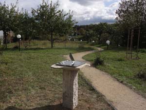  stainless sudial in an office landscape