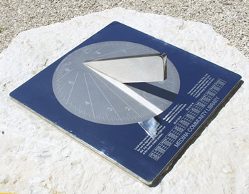 engraving on a Texas sundial